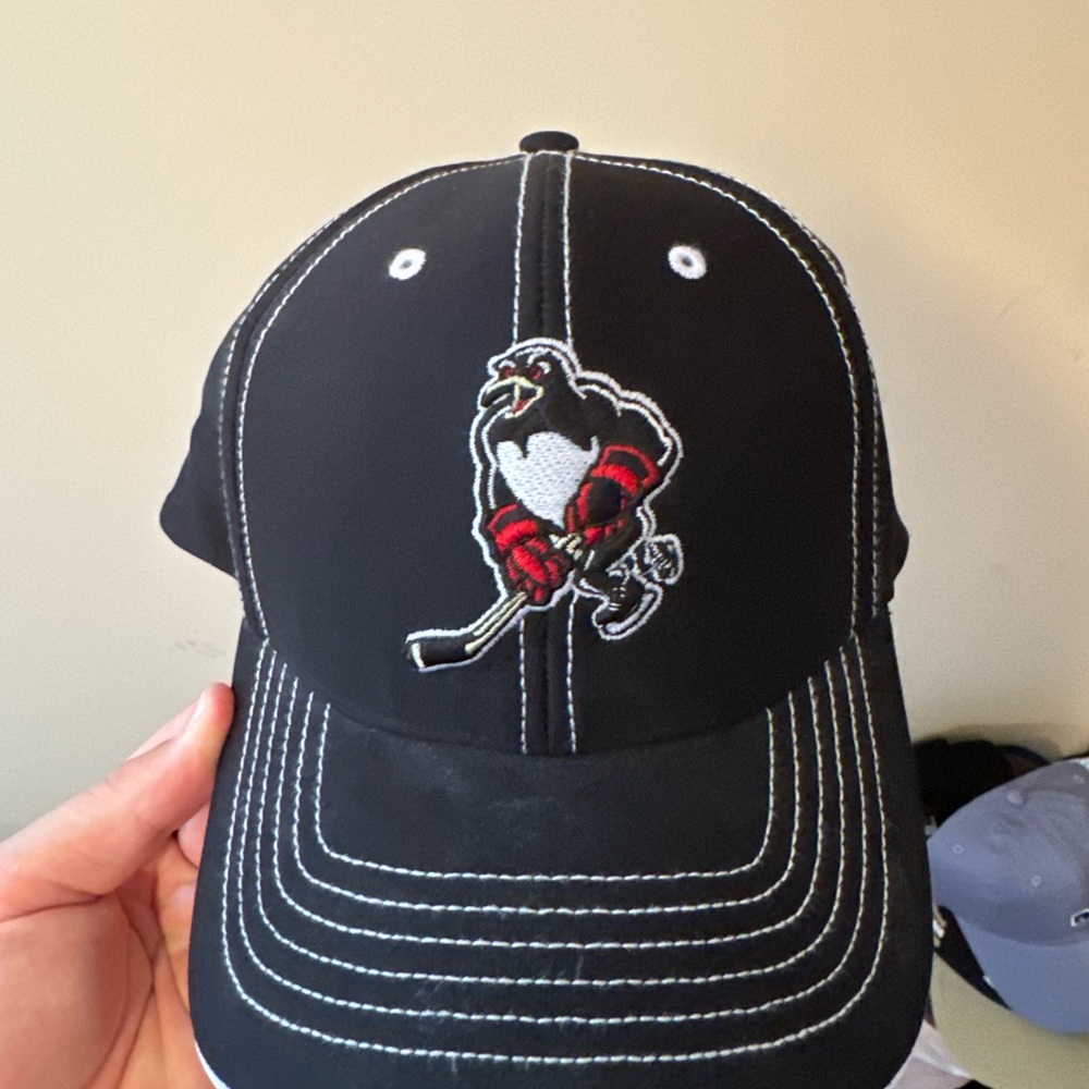 Black Wilkes Barre Penguins Hockey Cap with Embroidered Logo and Signature